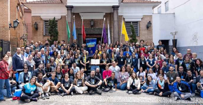 Pasconeiros e Pasconeiras reunidos para o Pascom em Ação 2023.